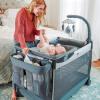 imageChicco Lullaby Zip AllinOne Portable Playard Infant Bassinet and Changer Electronic Toy Bar Toddler Playard Travel Friendly  DriftwoodGrey