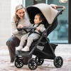 image:imageChicco Bravino Plus Lightweight Stroller Compact Travel Stroller AllWheel Suspension LieFlat Pramette Seat UPF 50 Canopy Compatible with KeyFit Infant Car Seats  OatBeige